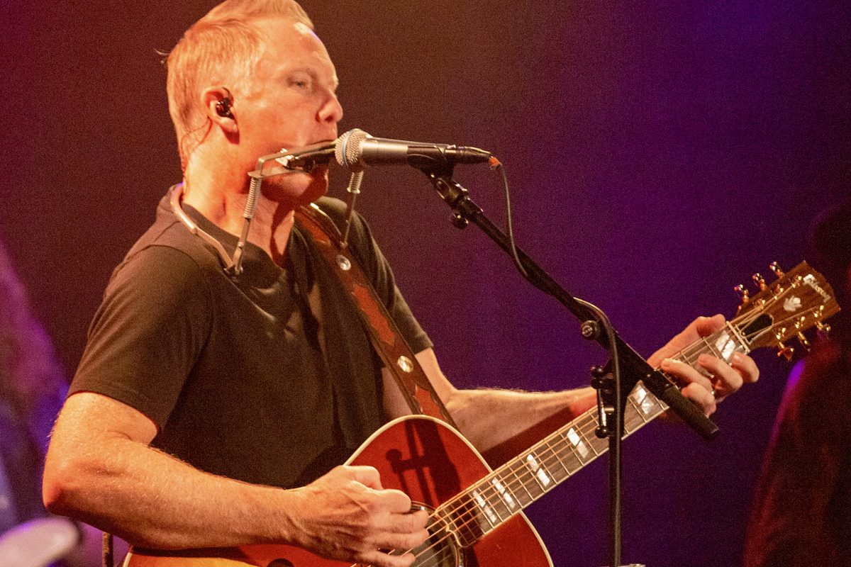 Stephen Ashbrook playing acoustic guitar at Crescent Ballroom
